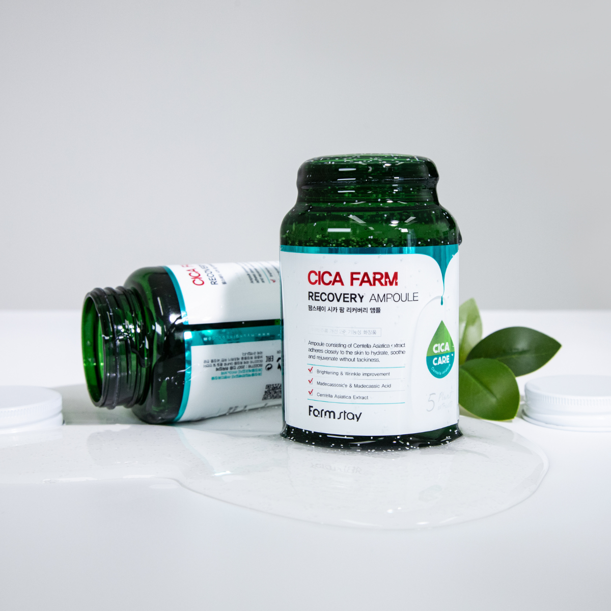 Farmstay Cica Farm Recovery Ampoule bottle, 250ml, with clear label and pump dispenser, showcasing skincare product for soothing skin.