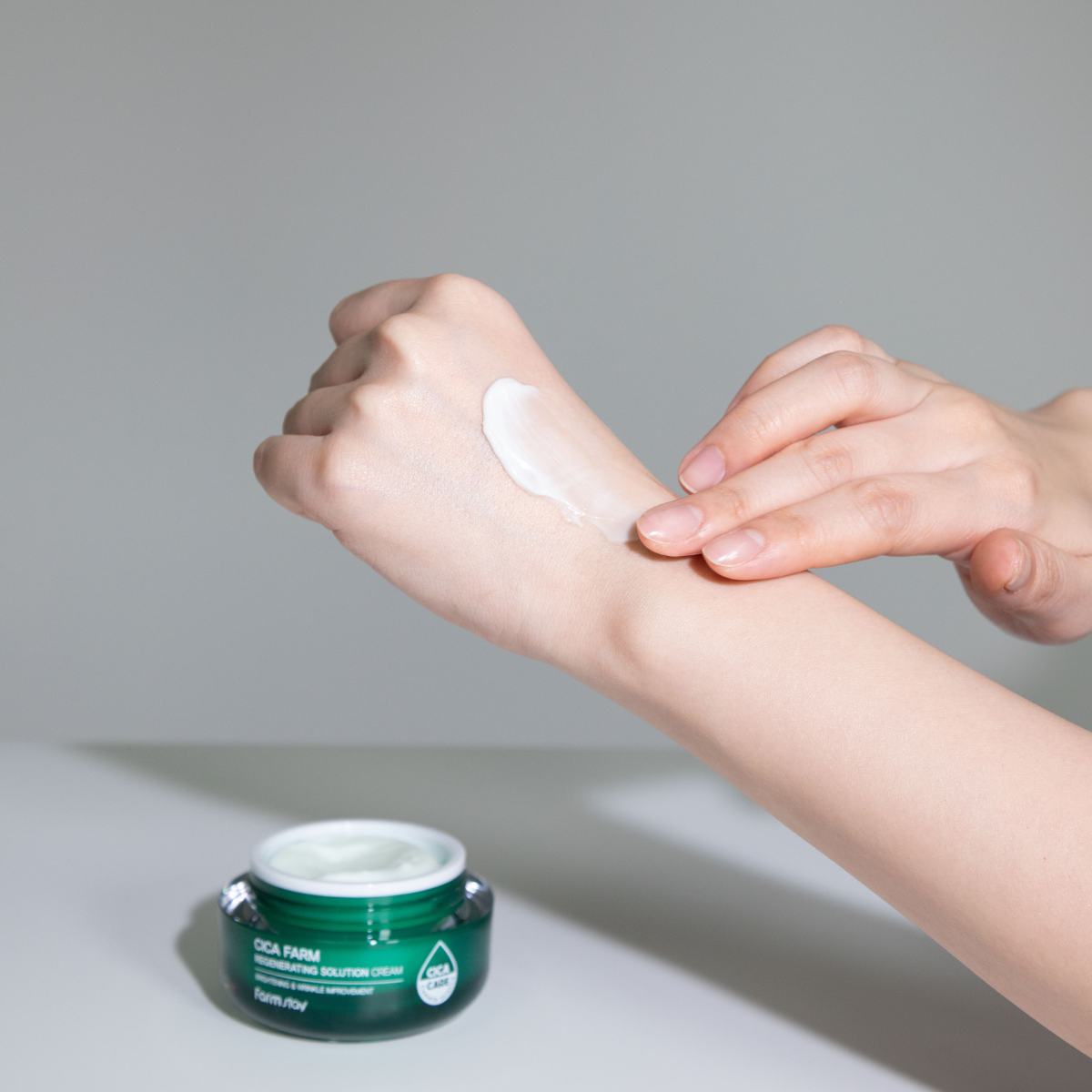 Farmstay Cica Farm Regenerating Solution Cream in 50ml jar, moisturizing face cream with calming and healing properties.
