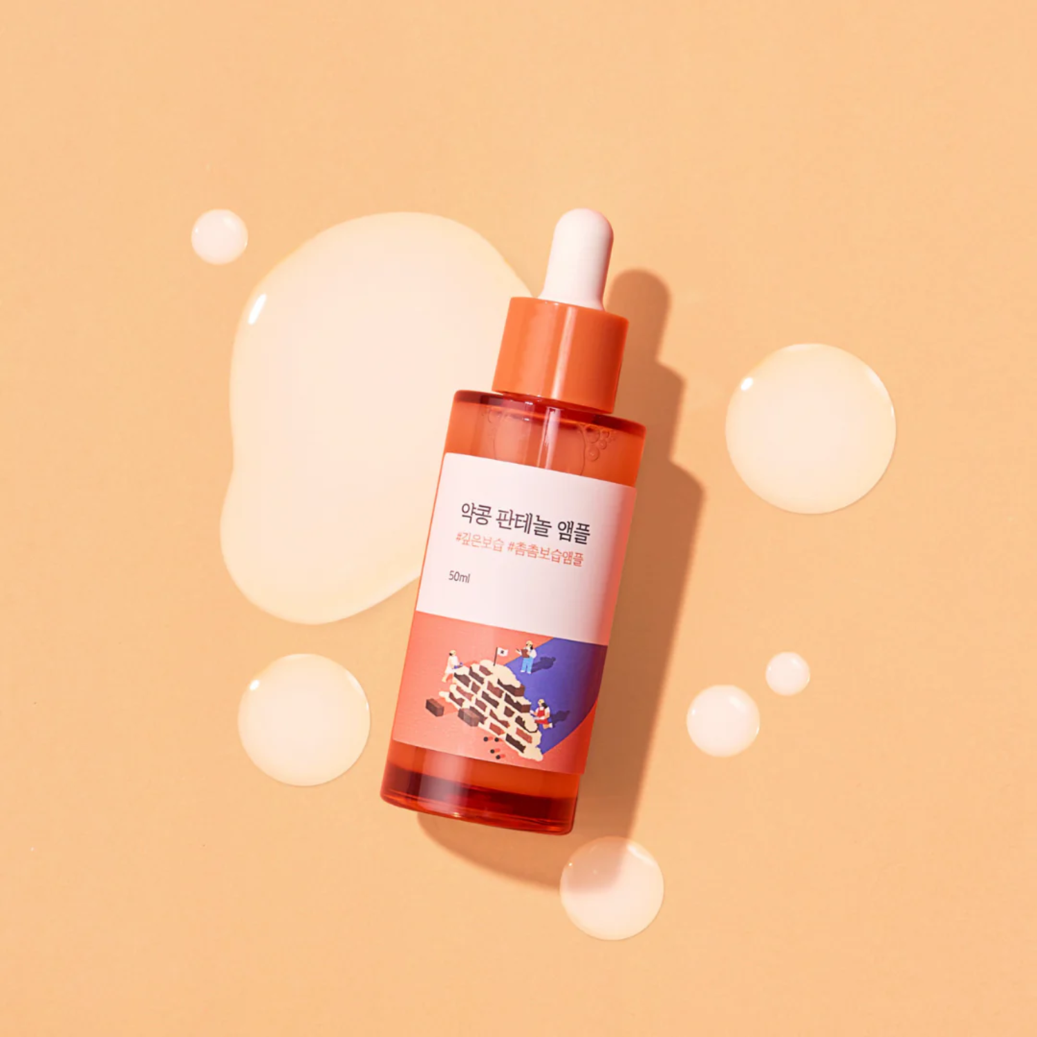 Round Lab Soybean Panthenol Ampoule 50ml, clear glass bottle with dropper cap, showing the skincare ampoule product.
