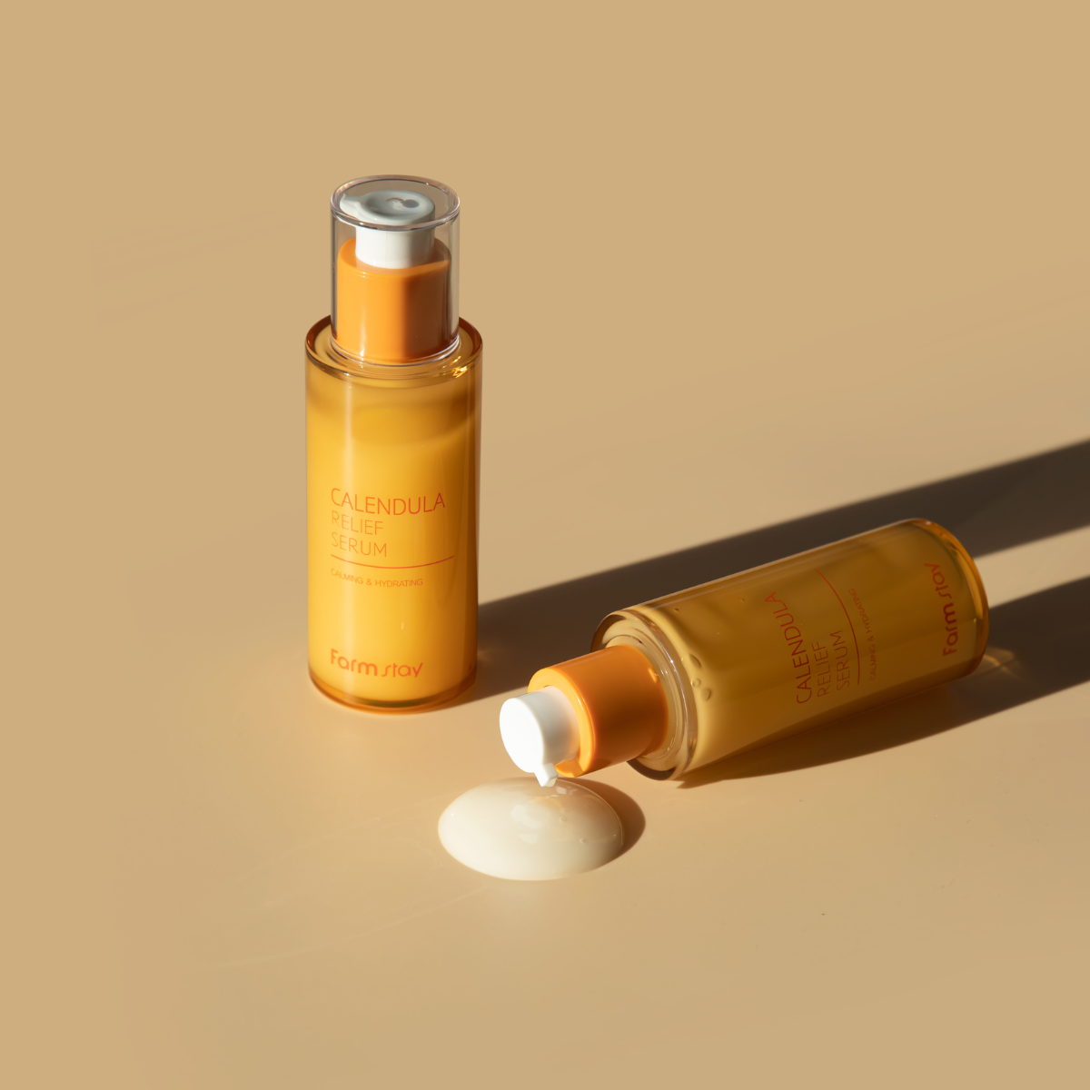 Farmstay Calendula Relief Serum 50ml bottle with a pump dispenser, featuring a clean, minimalistic design on a white background.