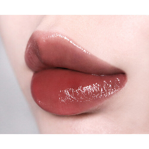 Too Cool For School Artclass Clair Tint lip tint in a sleek tube, featuring a soft pink shade and applicator for natural-looking color.