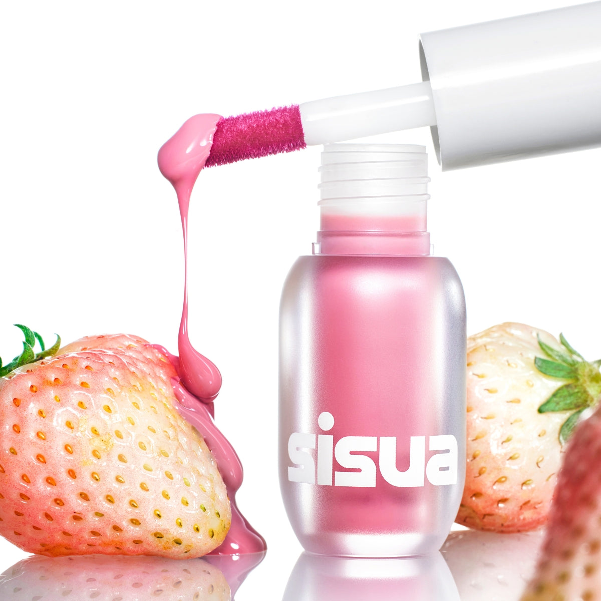 Unleashia Sisua Popcorn Syrup Lip Plumper tube with applicator for fuller, hydrated lips.