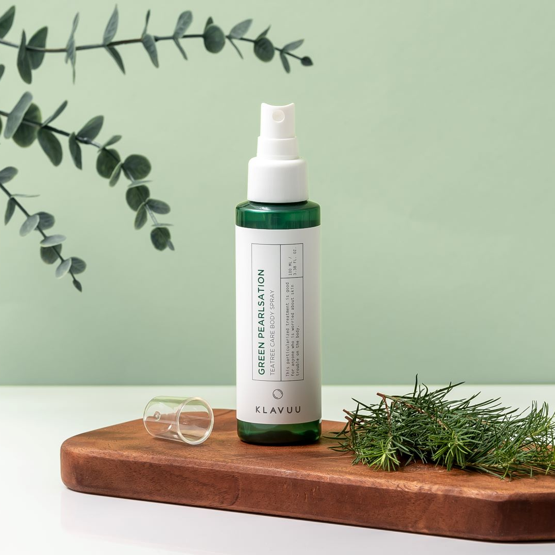 Klavuu Green Pearlsation Teatree Care Body Spray bottle with green and white packaging, 100ml, featuring a sleek design.