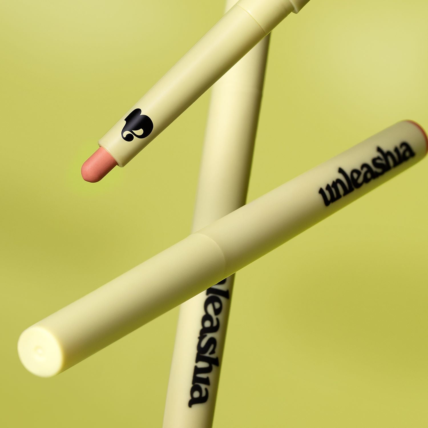 Unleashia Oh! Happy Day Lip Pencil lip liner in a neutral shade, with a sleek pencil design and sharpened tip for precise application.