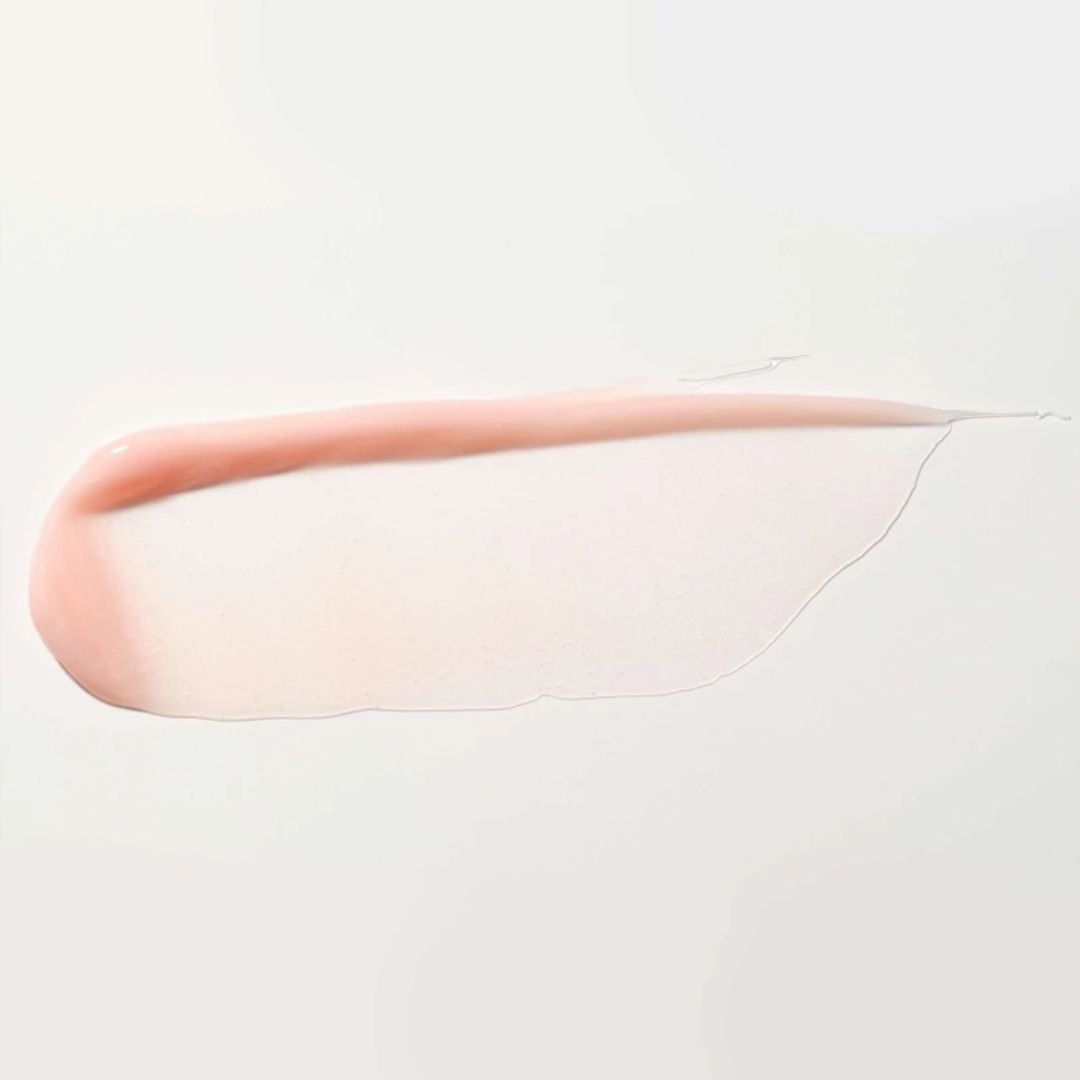 ARTDECO glossy lip volumizer and lip plumper with shiny finish, showing a close-up of lips enhanced with the product.