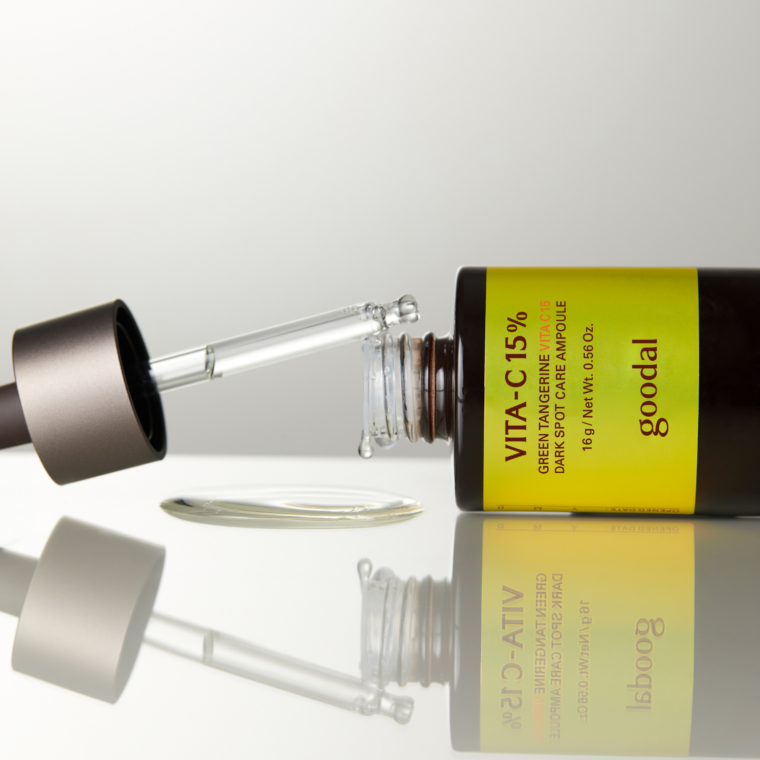 Goodal Green Tangerine Vita C 15 Dark Spot Care Ampoule in a glass dropper bottle with green and orange labeling.