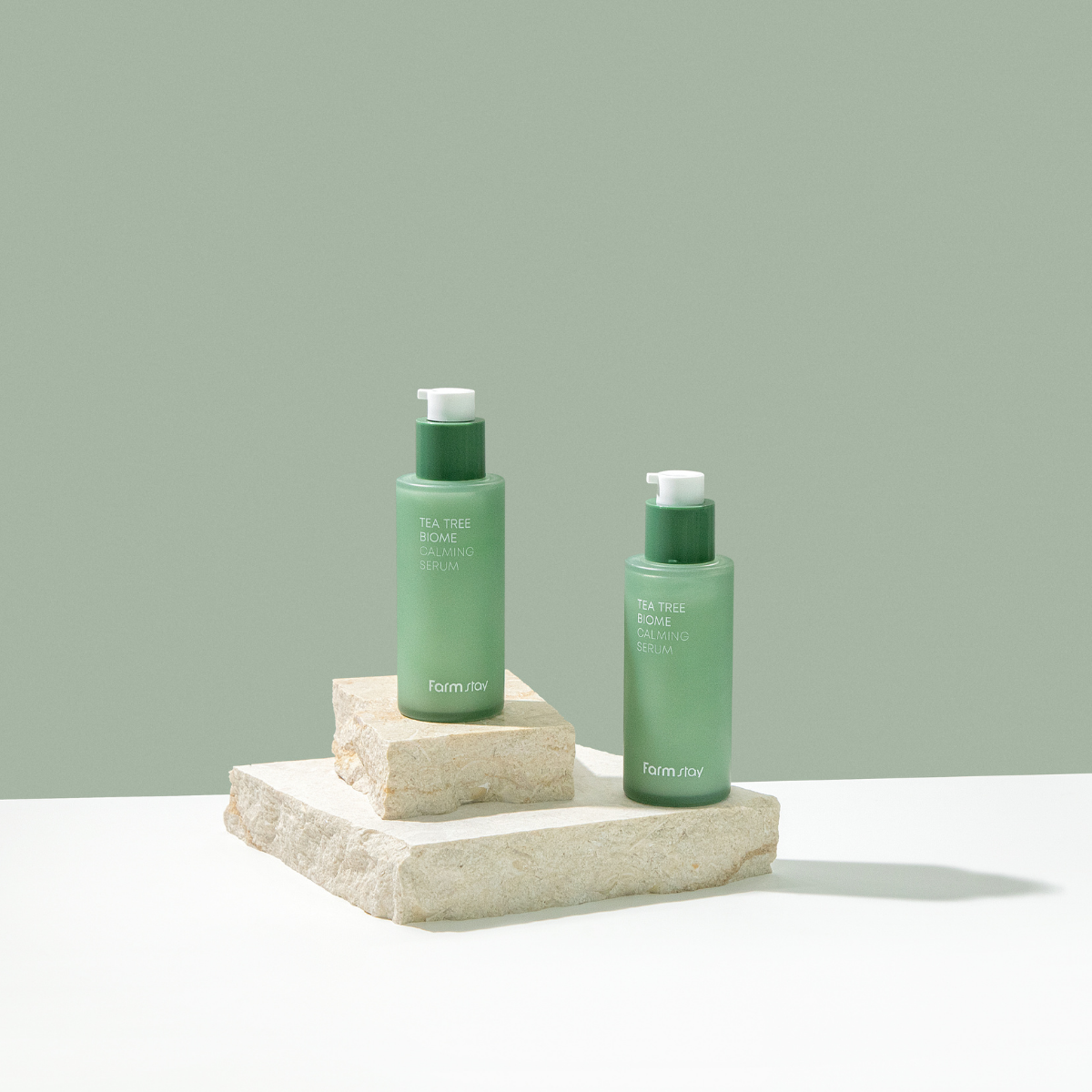 Farmstay Tea Tree Biome Calming Serum 50ml bottle showing the clear serum in a sleek dropper bottle.