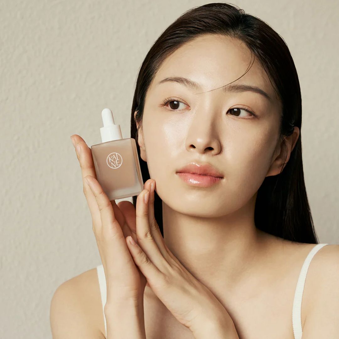 Kaine Kombu Barrier Ampoule 30ml, clear skincare serum in a glass bottle with a dropper for nourishing skin protection.