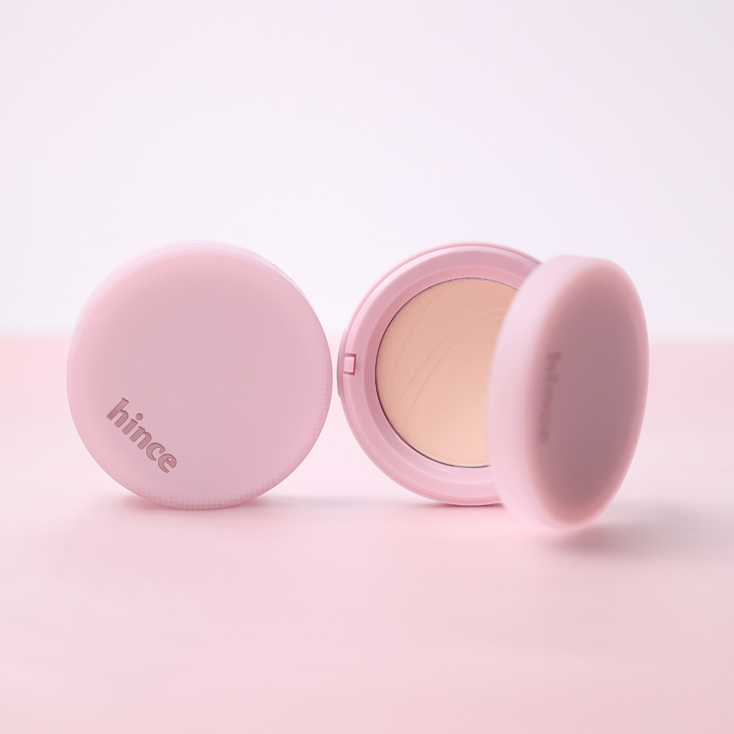 Hince Second Skin Airy Powder setting powder in a sleek container, designed for a lightweight, matte finish on the skin.