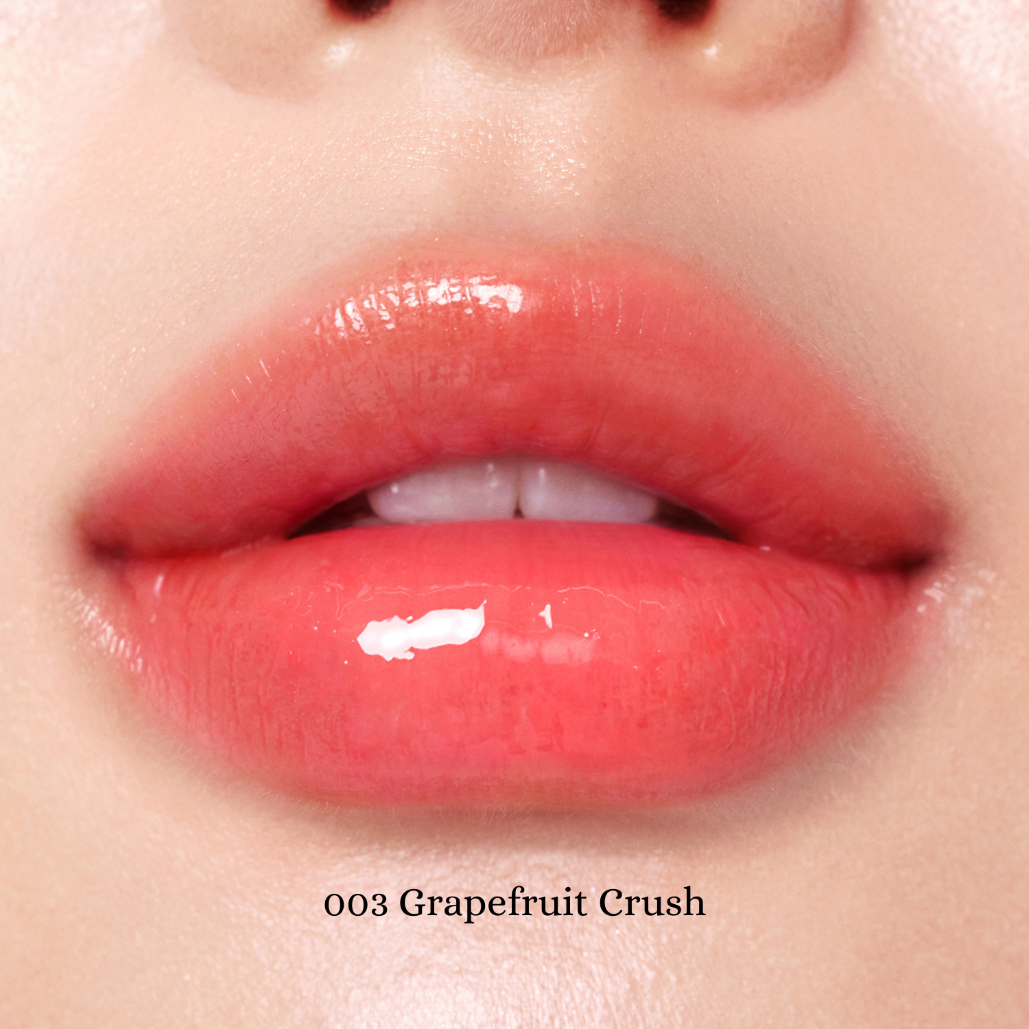 Peripera Heart Jam Glow Lipstick with glossy pink finish and heart-shaped packaging, perfect for a vibrant, shiny lip look.