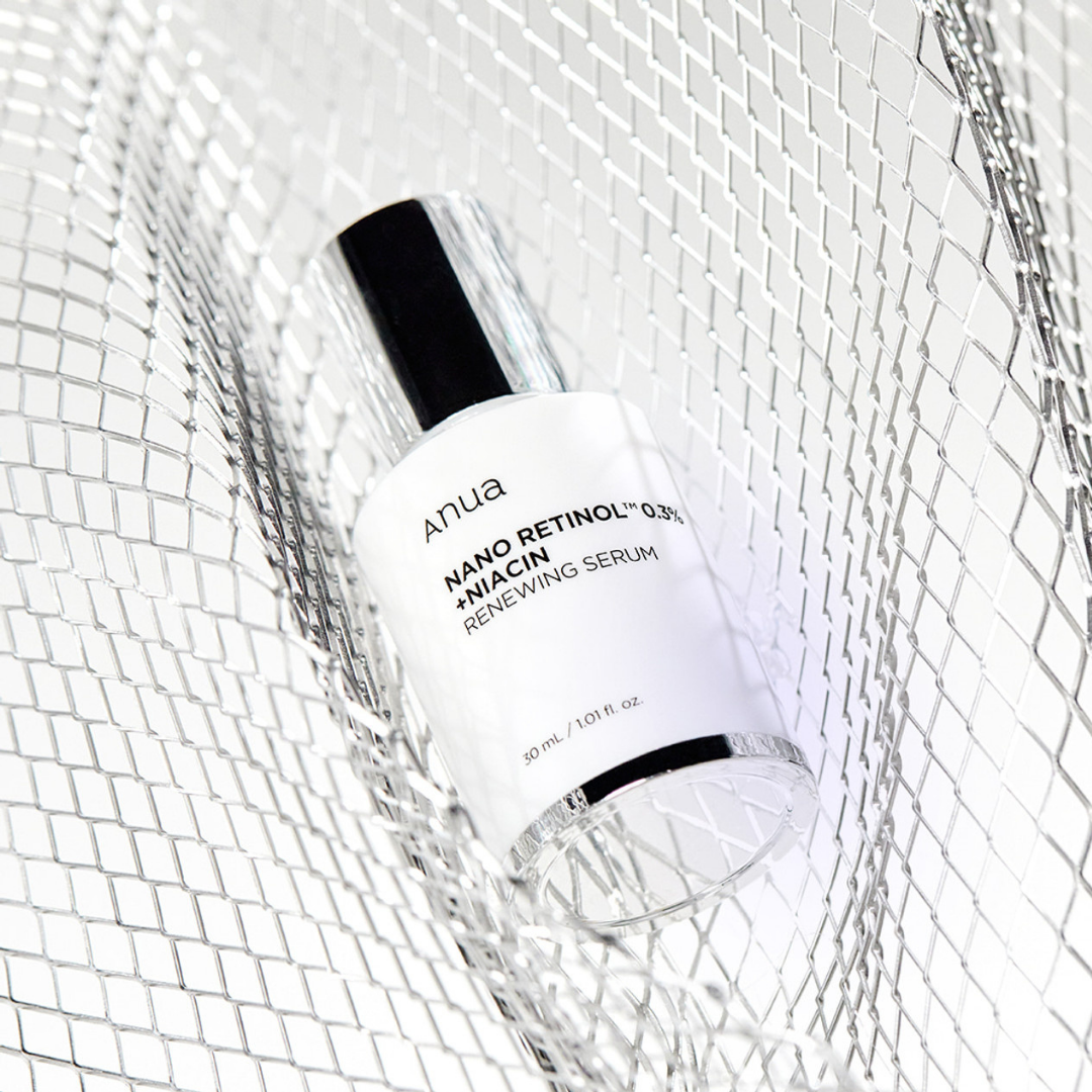 Anua Nano Retinol 0.3% + Niacin serum in a 30ml bottle, shown with the serum bottle and its packaging.