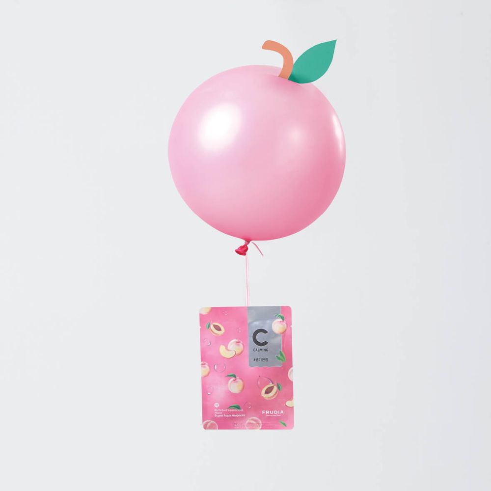 Frudia My Orchard Squeeze Peach vegan sheet mask with peach extract, shown in the packaging, designed for nourishing and hydrating skin.