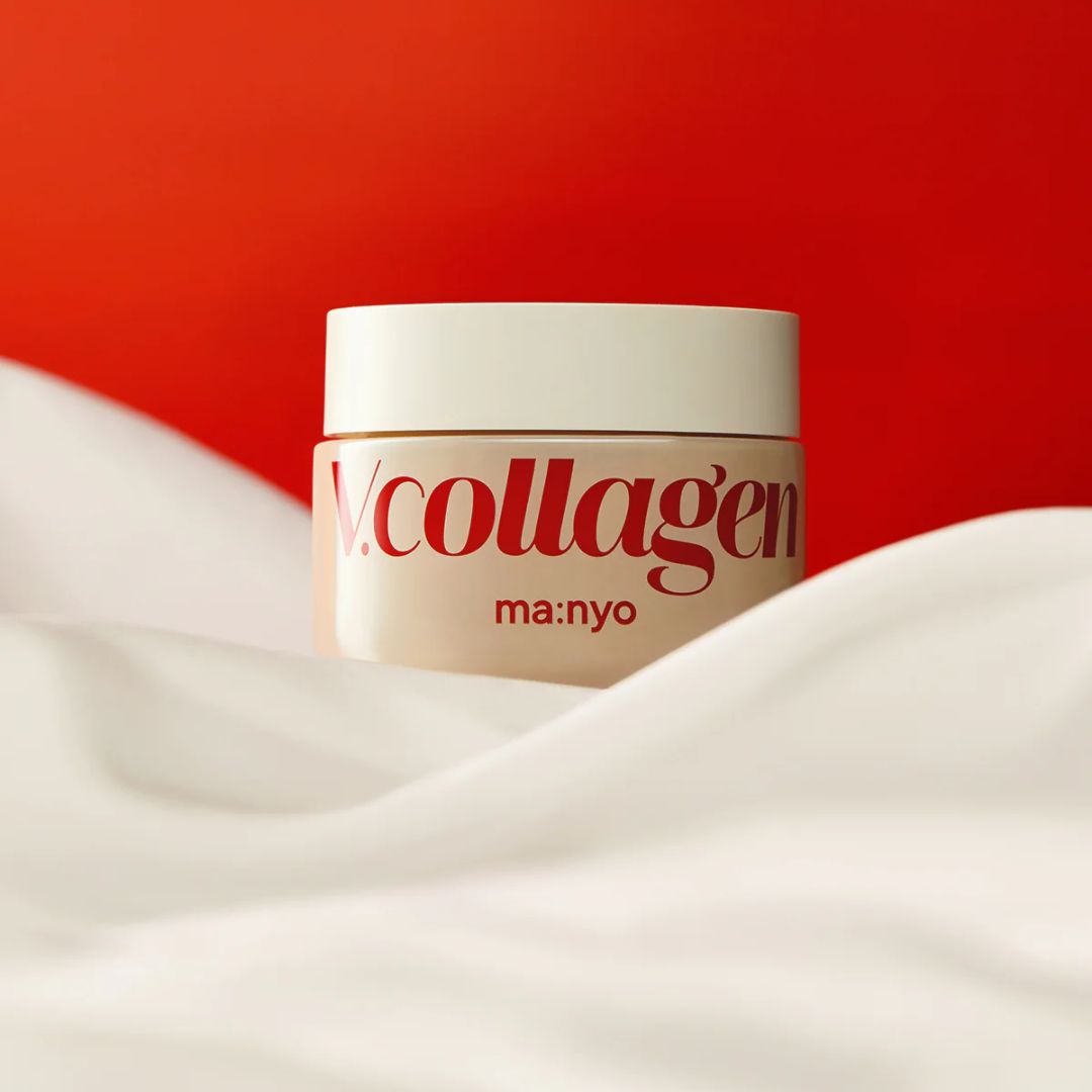 Ma:nyo Vcollagen Heart Fit Cream 50ml face moisturizer jar with pink and white packaging, showcasing the cream's smooth texture.