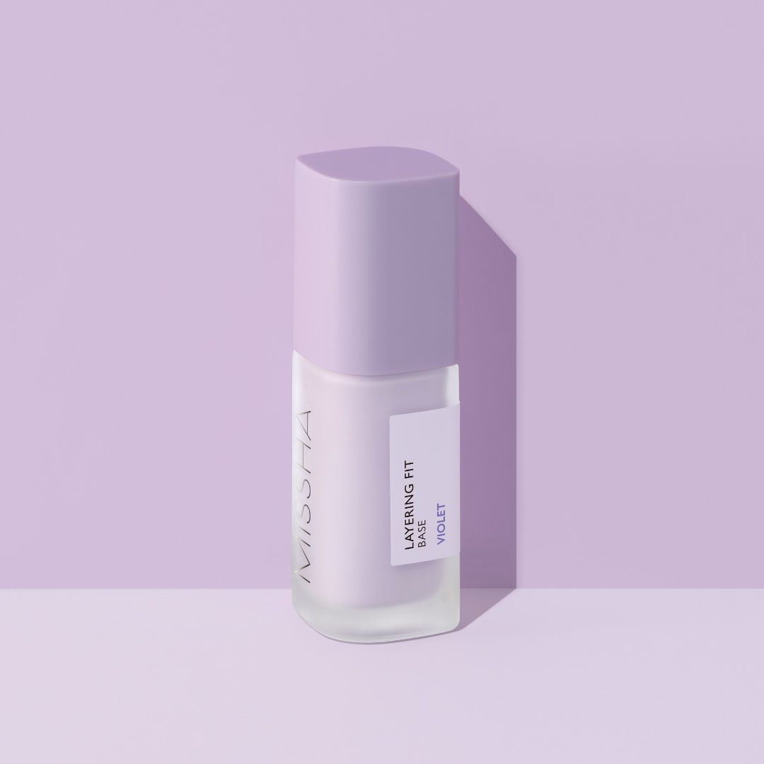 Missha Layering Fit Face Primer showing smooth, lightweight texture in a clear tube with branding visible.