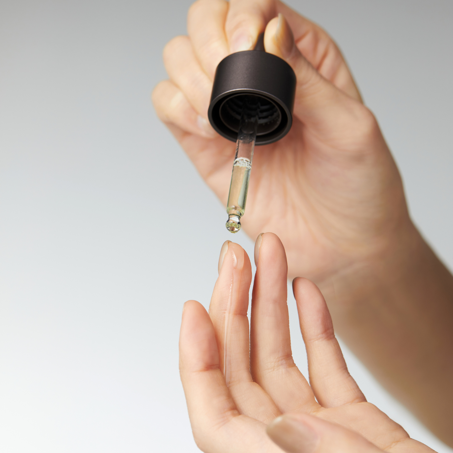 Goodal Green Tangerine Vita C 15 Dark Spot Care Ampoule bottle with bright label and dropper cap, designed for skincare treatment.