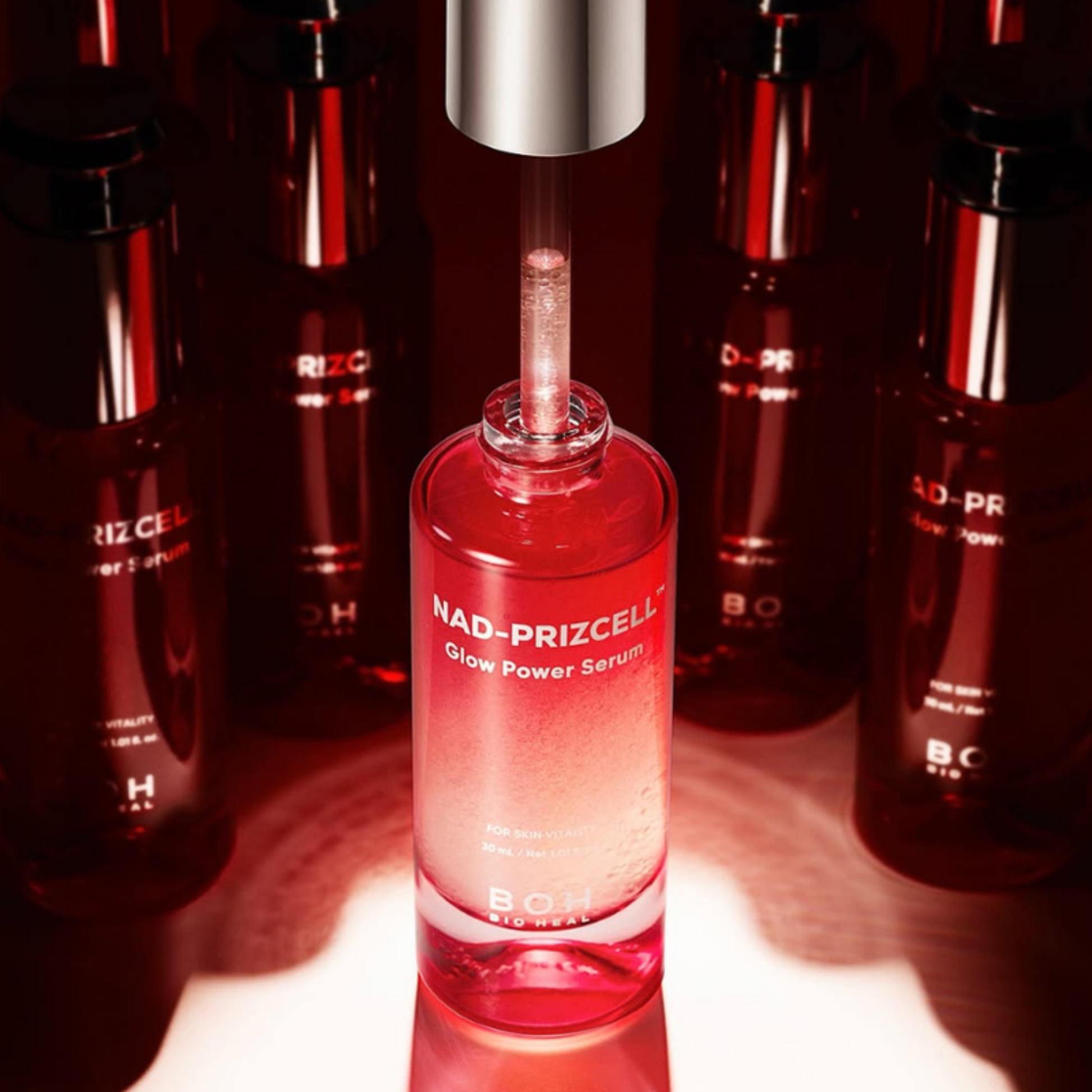 Bioheal BOH Nad-Prizcell™ Glow Power Serum in a 30ml bottle, shown with the serum's sleek packaging and applicator.