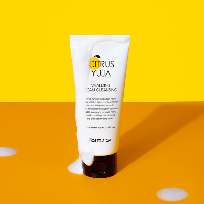 Farmstay Citrus Yuja Vitalizing Foam Cleanser in 100ml gel and foam, showcasing the bright yellow tube and clean design.