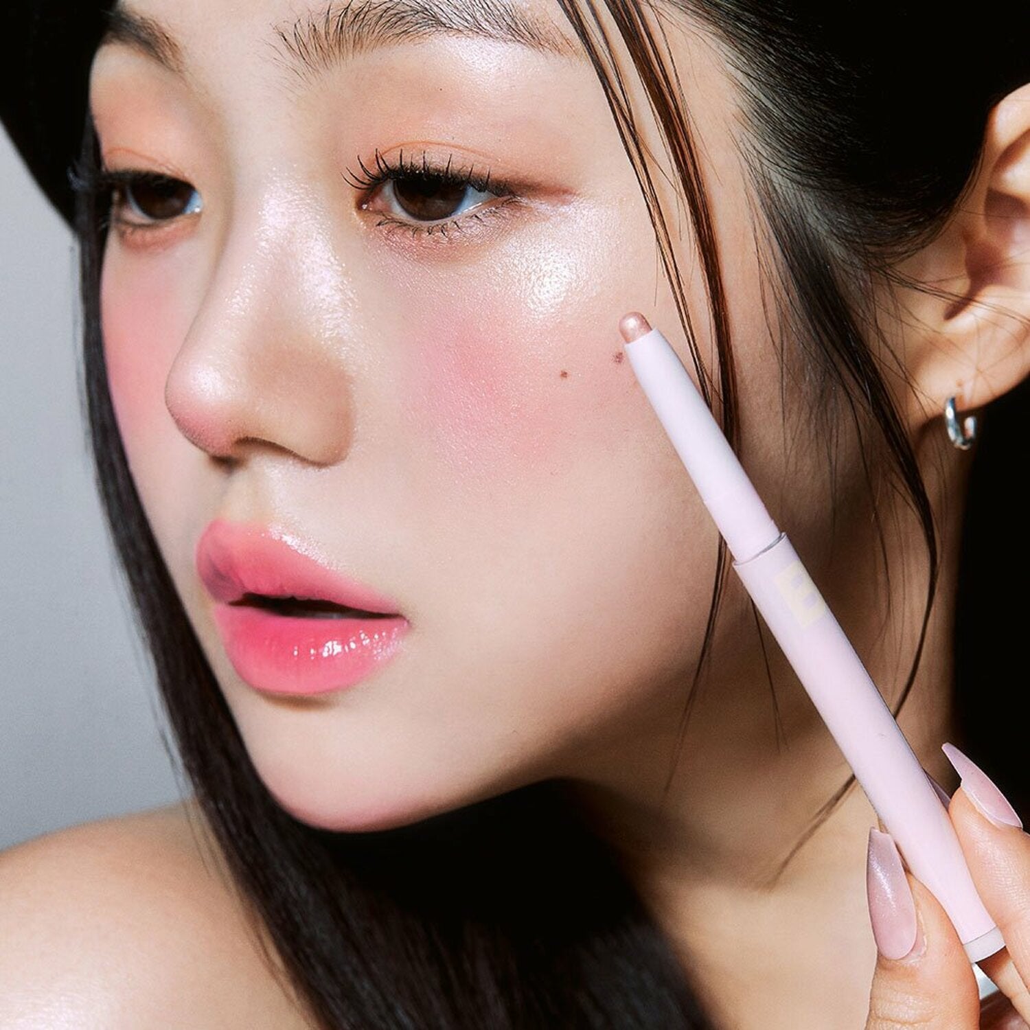 Banila Co B. By Banila Mood On Eye Color Stick eyeshadow in vibrant shade, shown on the product with the stick and packaging.