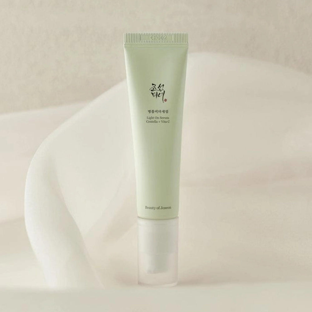Beauty of Joseon Light On Serum Centella and Vitamin C in a 30ml bottle, showing the serum's clear liquid and minimalist packaging.