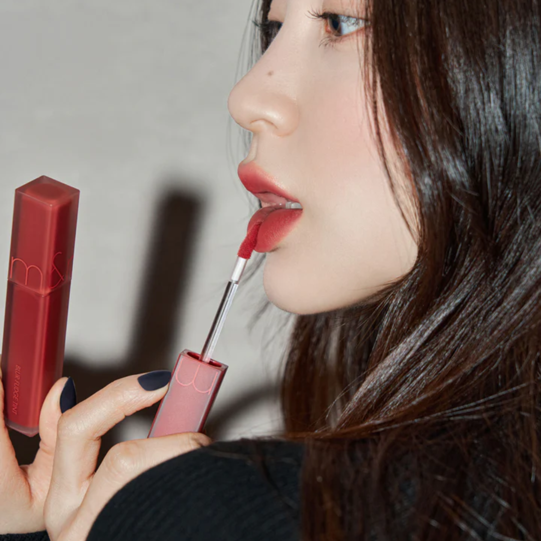 Rom&nd Blur Fudge Lip Tint in soft, tinted shade with a smooth, blurred finish on lips, showcasing natural, even color.