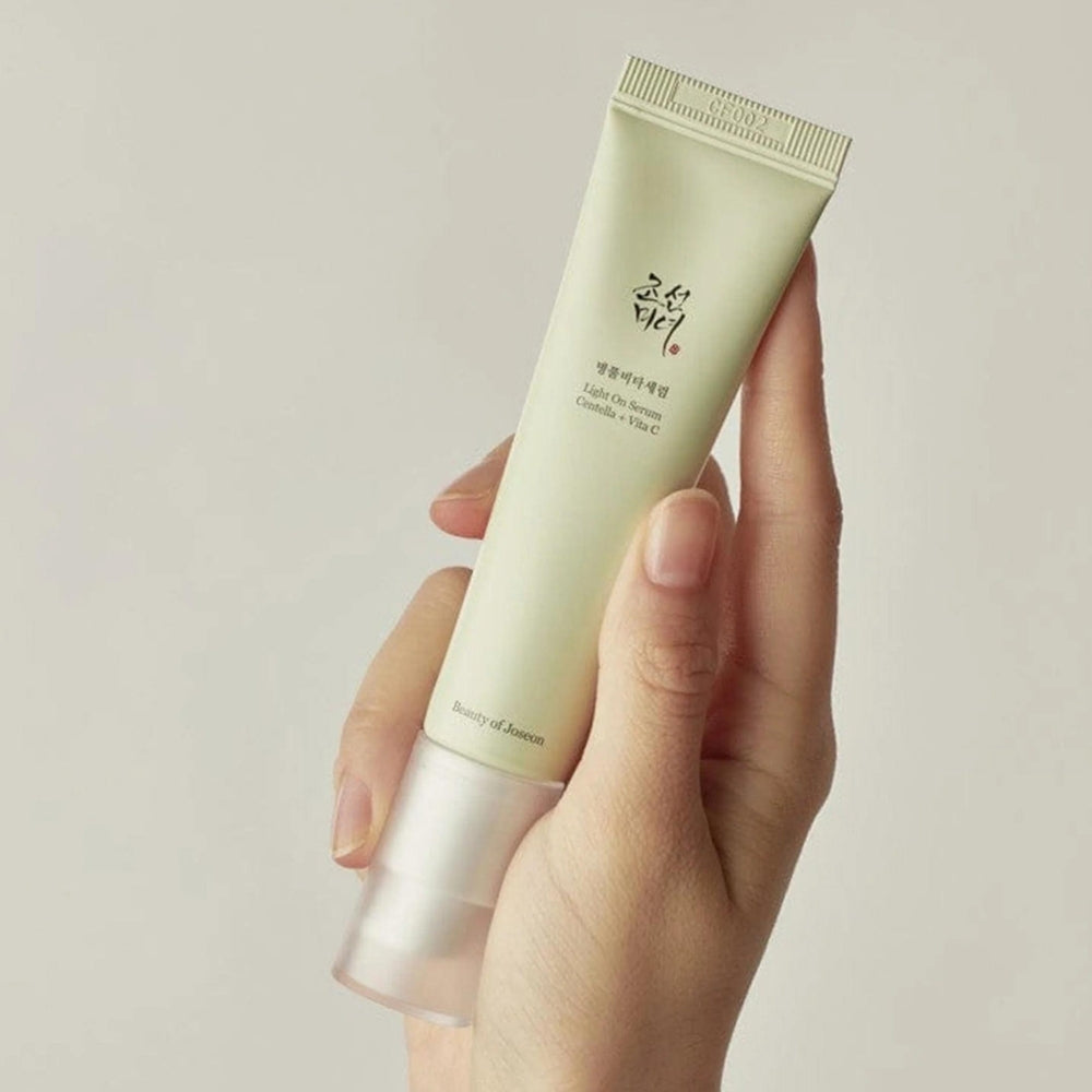 Beauty of Joseon Light On Serum Centella and Vita C in a 30ml bottle, showcasing the serum's clear, lightweight formula with dropper.