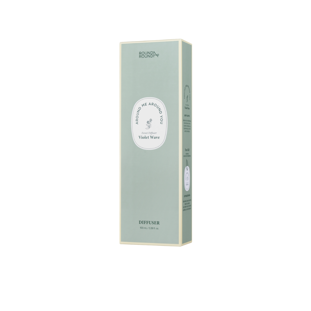 ROUND A’ROUND Forest Diffuser 100mL Violet Wave with elegant glass bottle and reed sticks for aromatic home scent.
