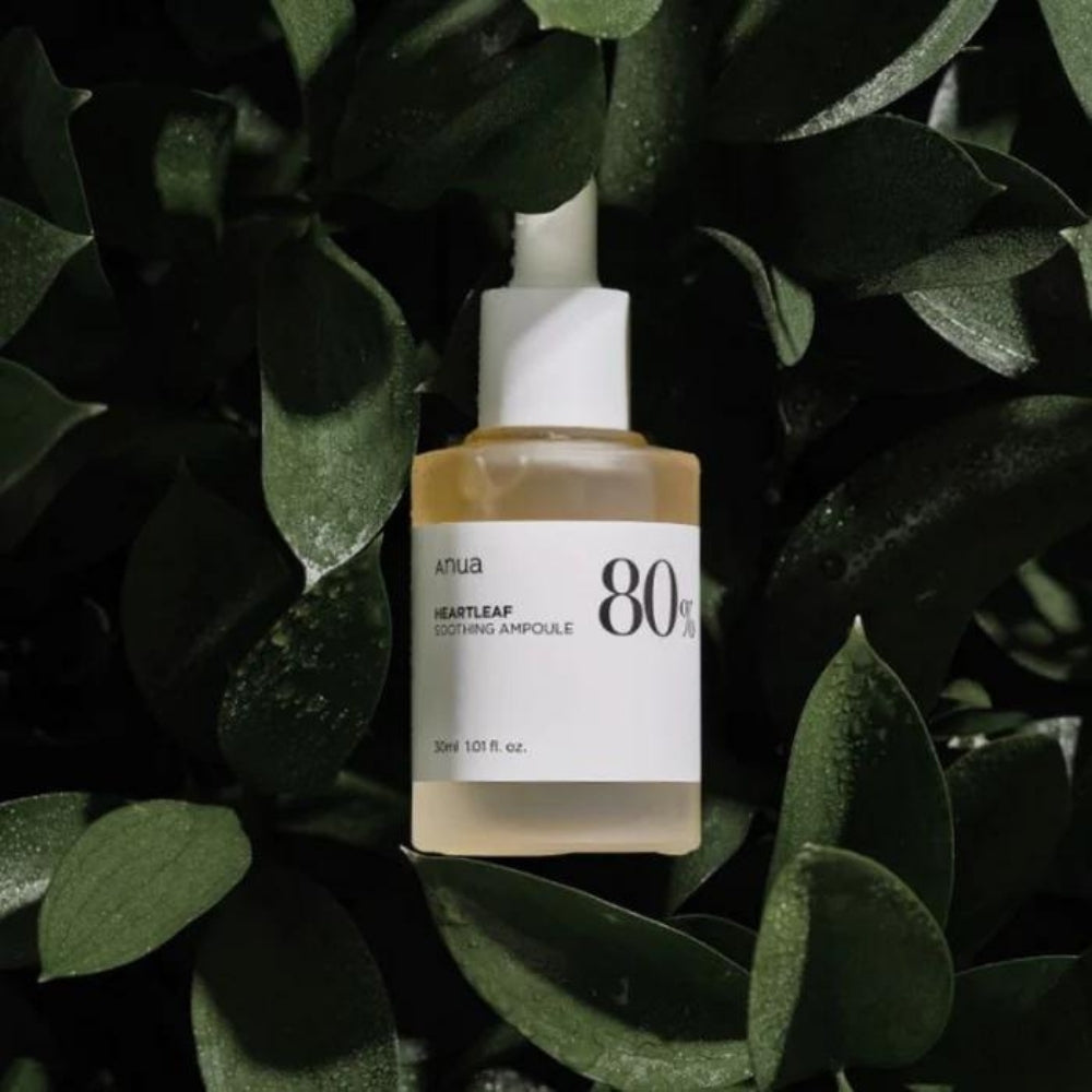Anua Heartleaf 80% Ampoule bottle, 30ml, with a clear glass container and white pump dispenser against a neutral background.