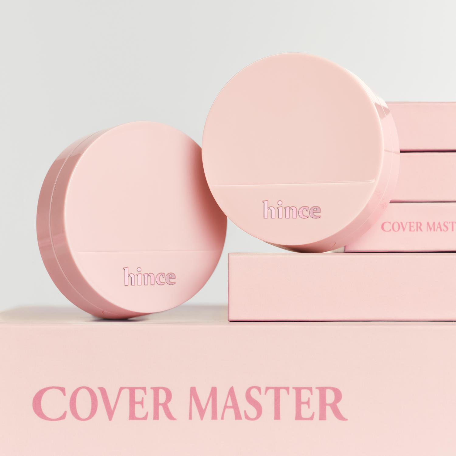 Hince Cover Master Pink Cushion foundation in a compact with pink packaging, showing the cushion sponge and applicator.