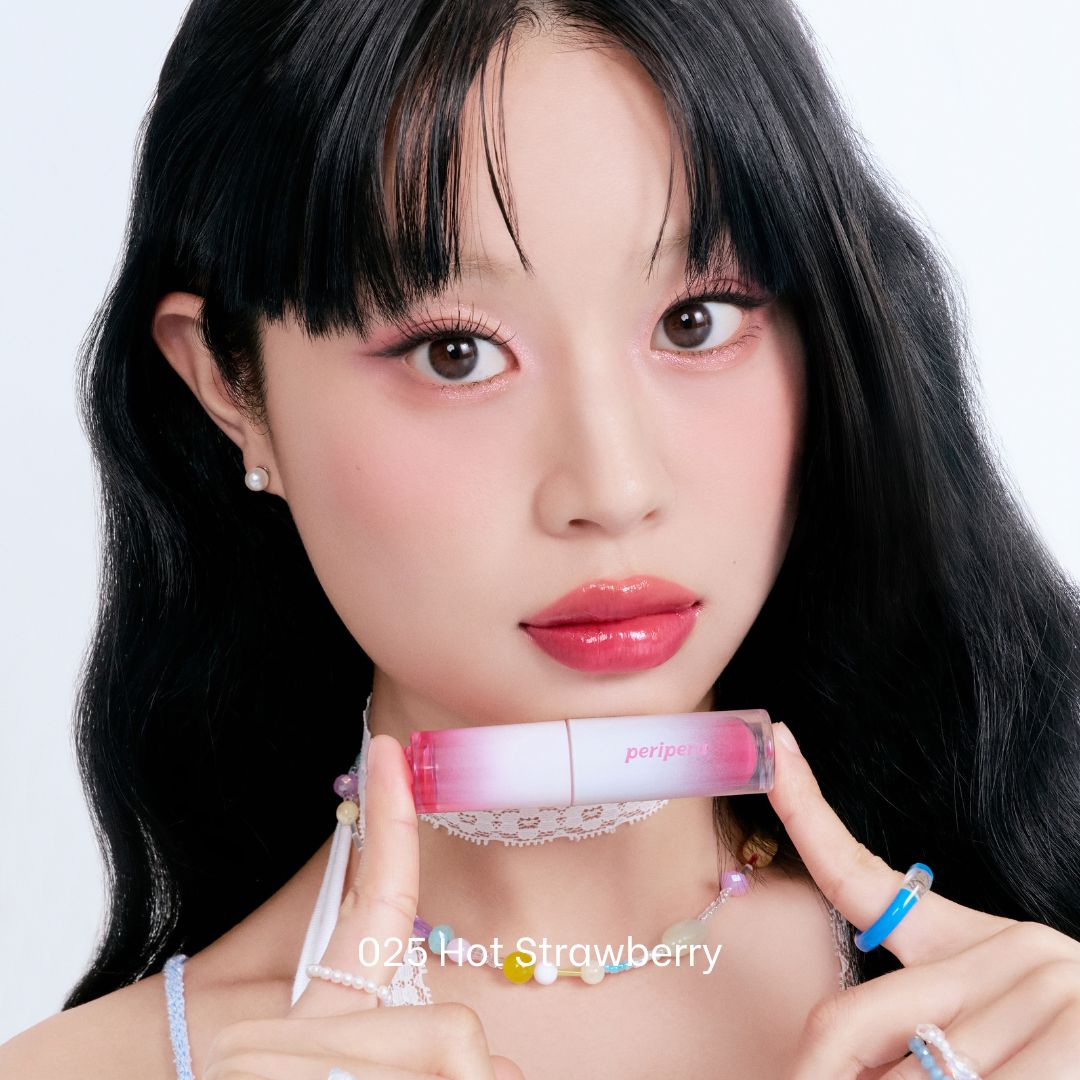 Peripera Ink Mood Glowy Tint Soda Cafe version in a sleek lip tint tube, showcasing the vibrant, glossy color inside.