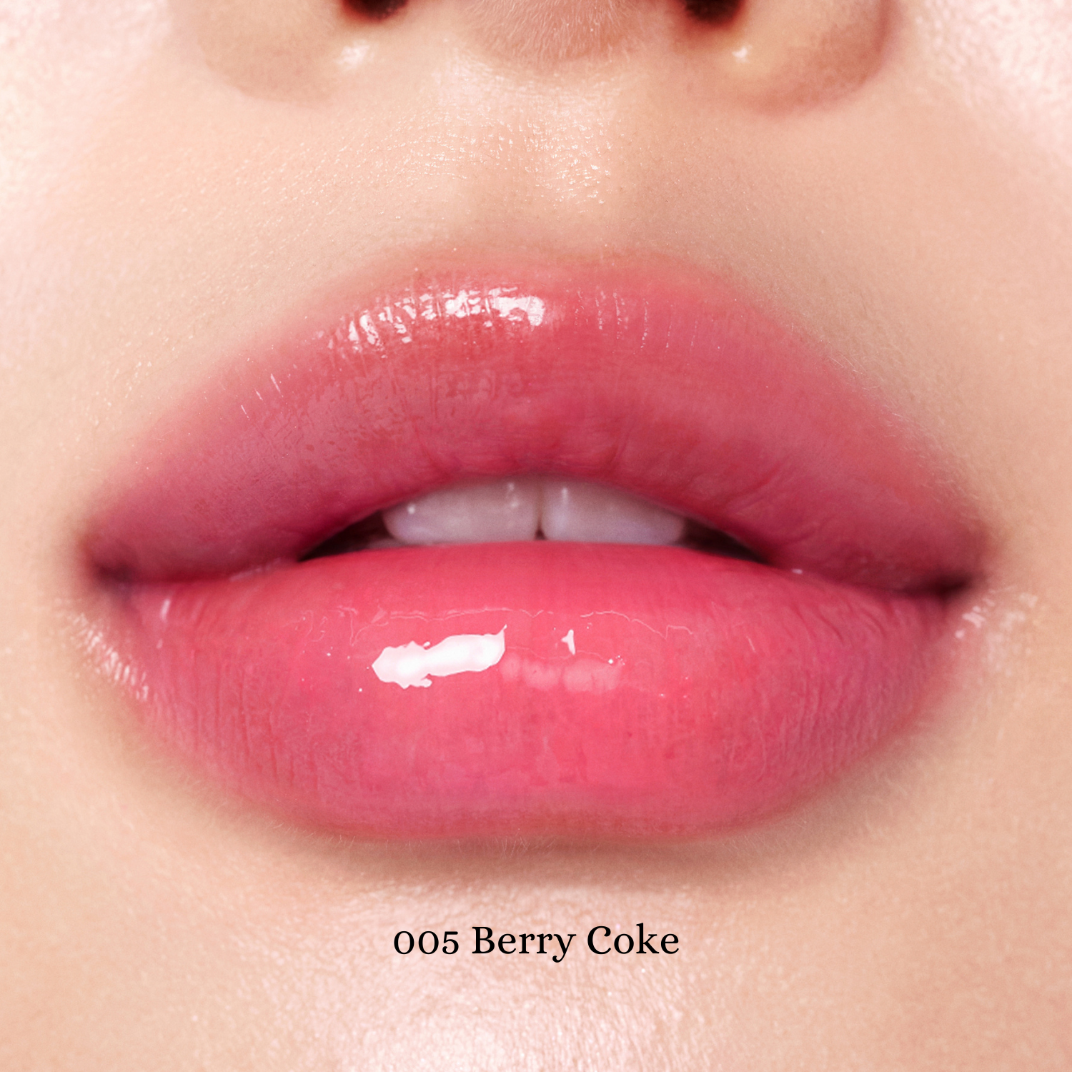 Peripera Heart Jam Glow Lipstick in a vibrant pink shade, featuring smooth, glossy finish and heart-shaped packaging.