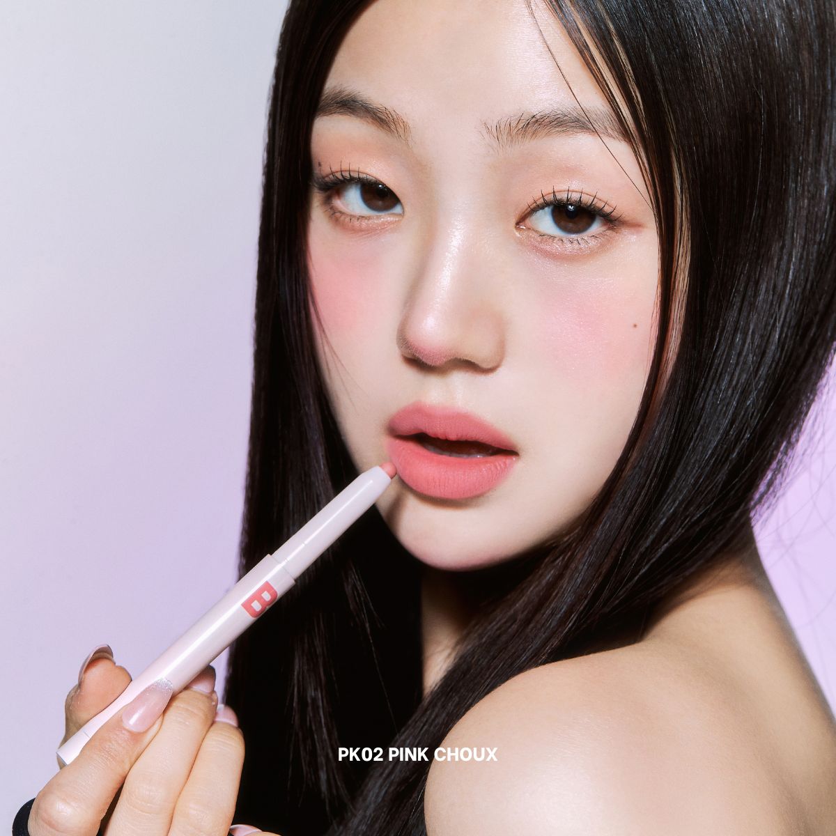 Banila Co B. By Banila Smudging Lip Pencil lip liner with a sleek, creamy texture in a natural shade, displayed on a white background.