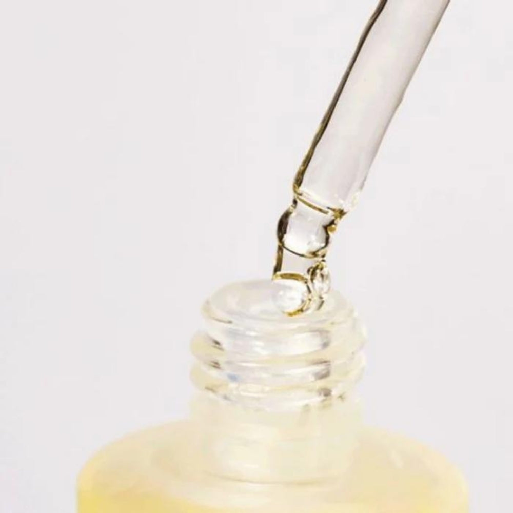 Anua Heartleaf 80% Ampoule bottle with dropper, 30ml, featuring green and white packaging on a white background