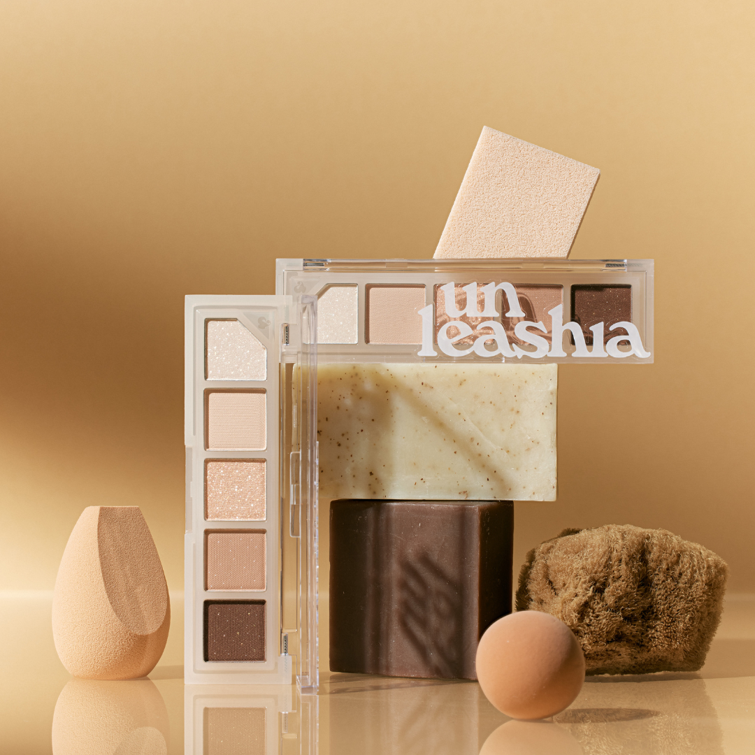 Unleashia Mood Shower Eyeshadow Palette with vibrant shades and neutral tones, perfect for expressive eye makeup looks.