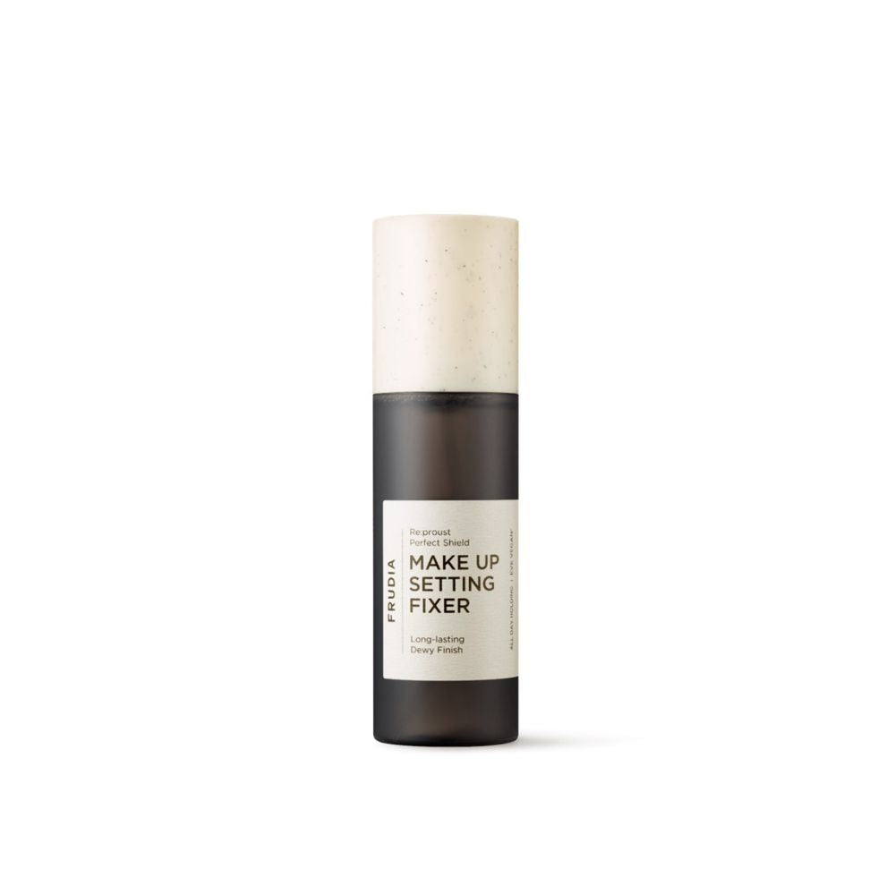 Frudia Re:proust Perfect Shield makeup setting spray bottle with 120ml capacity, featuring a sleek design and spray nozzle.
