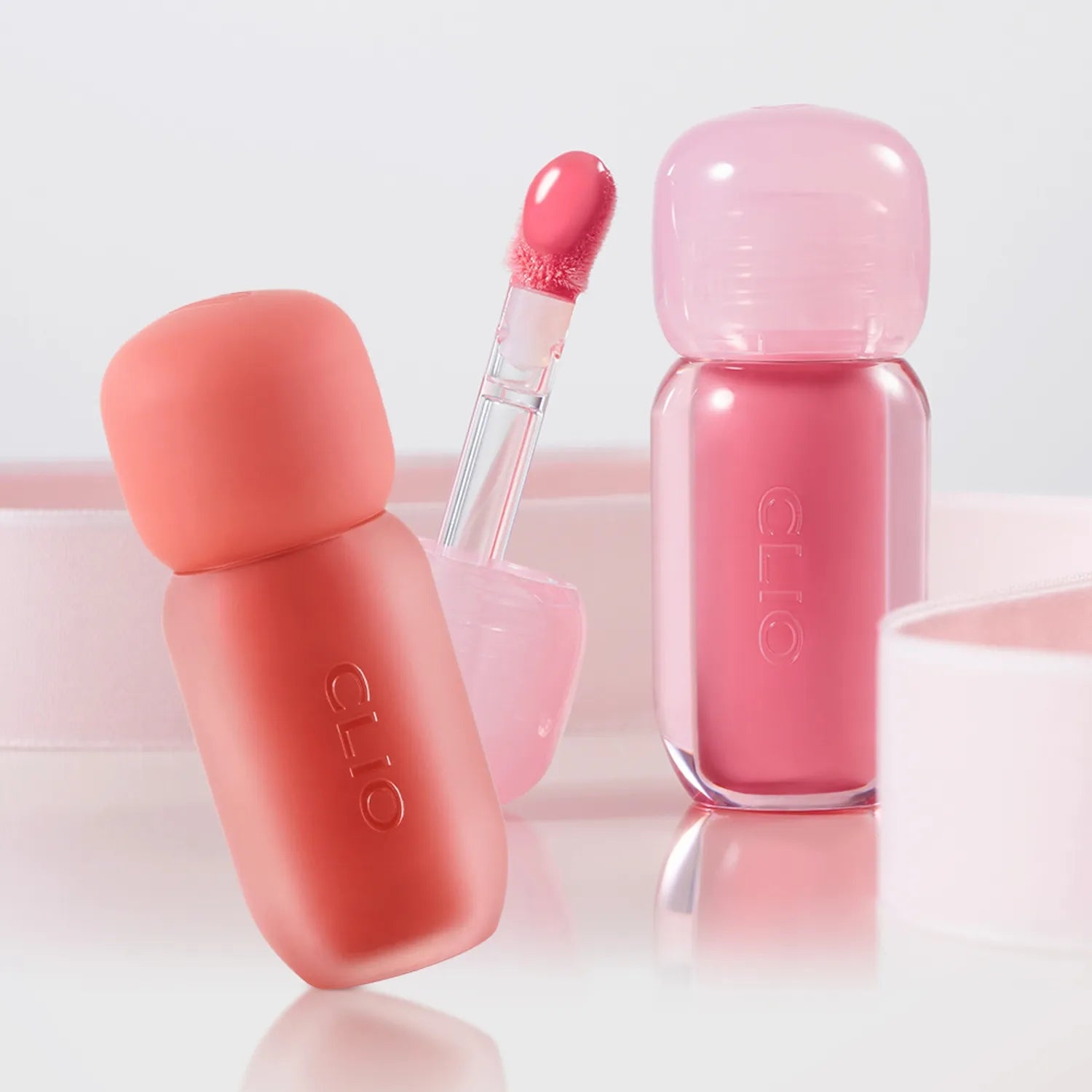 Clio Volumate Blur Tint lip tint palette with 8 shades, showing swatches of various natural and vibrant lip colors.