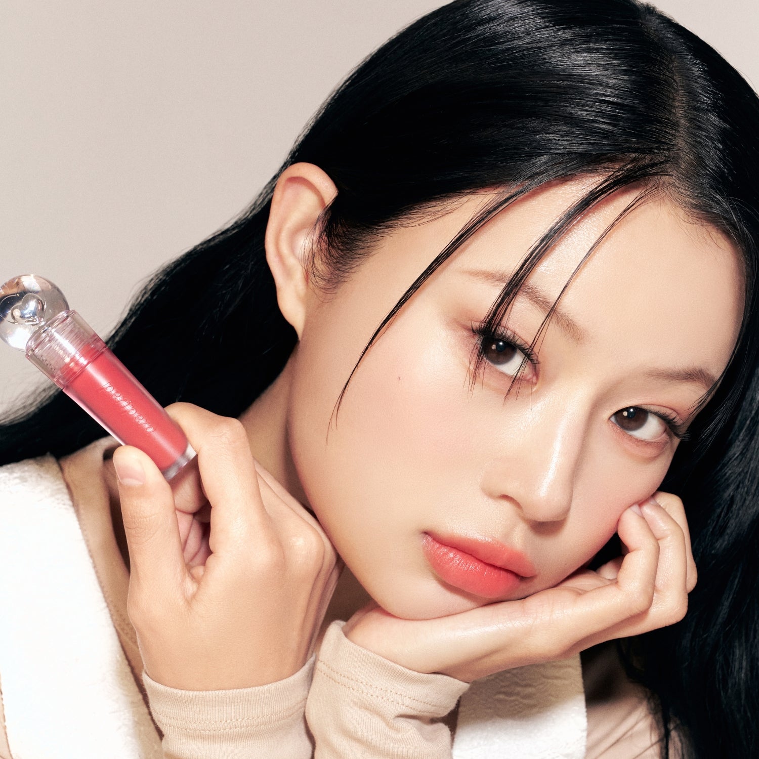 Peripera Ink Jellable Lip Tint in shade 91, showing the smooth, glossy pink lip tint applied on lips