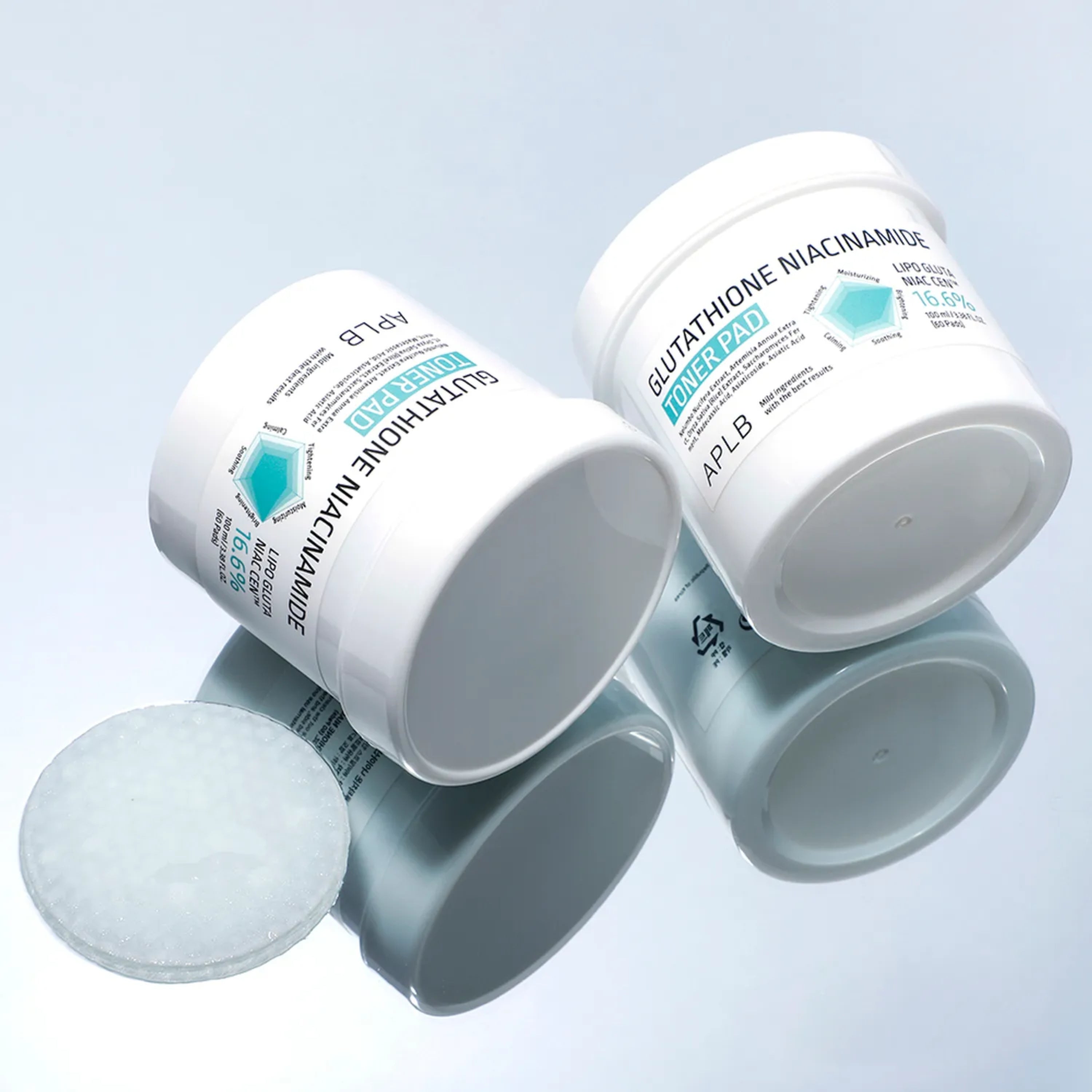 APLB Glutathione Niacinamide Toner Pad 100ml, soft cotton pad soaked in brightening skincare solution with antioxidants.