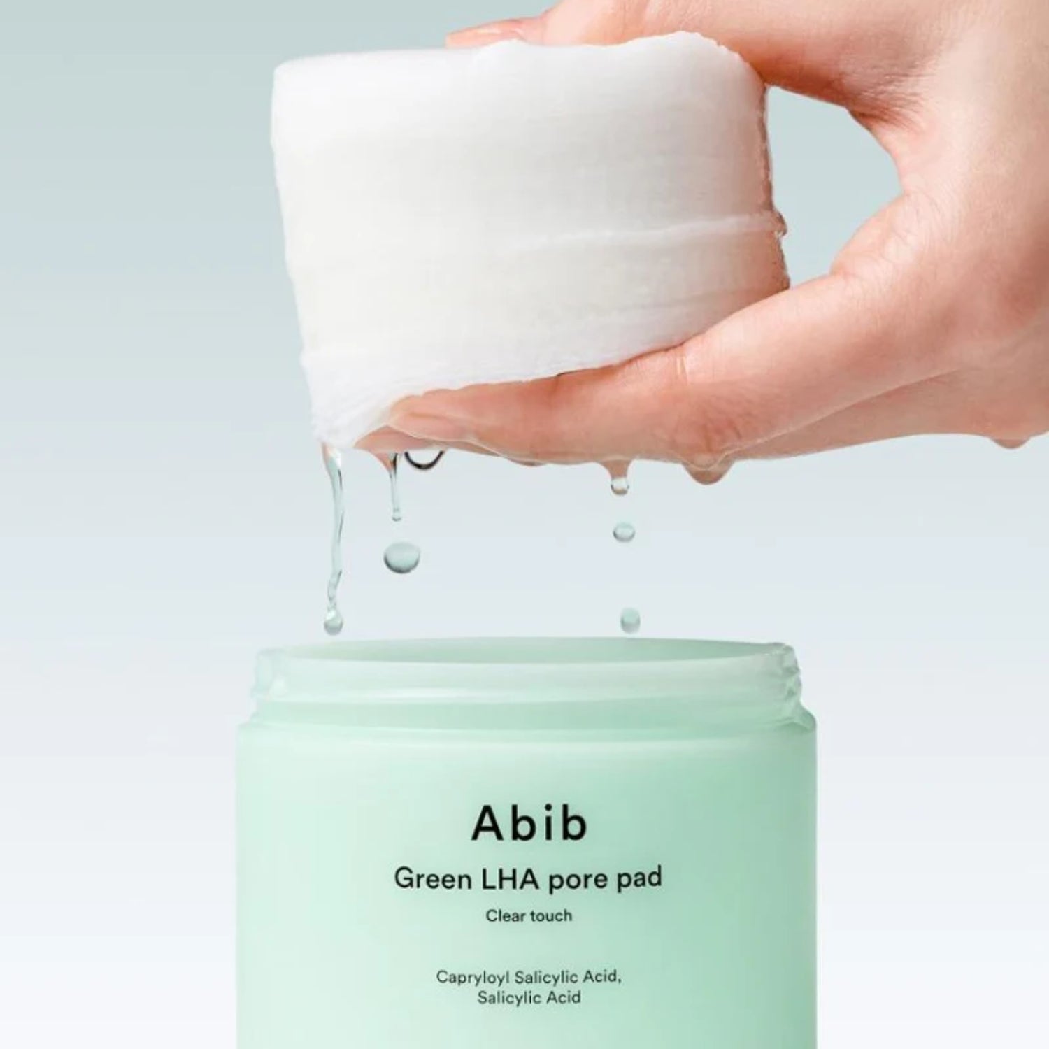 Green LHA Pore Pad Clear Touch toner pads by Abib, 60 soft pads for pore cleansing and brightening in a green packaging.