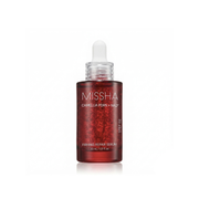 Missha PDRN Nad Firming Repair Serum 30ml bottle, showcasing the sleek packaging and clear liquid serum inside.
