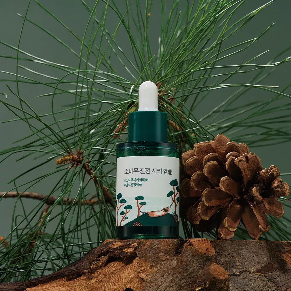 Round Lab Pine Calming Cica Ampoule 30ml bottle with clear glass and dropper for soothing skin treatment.