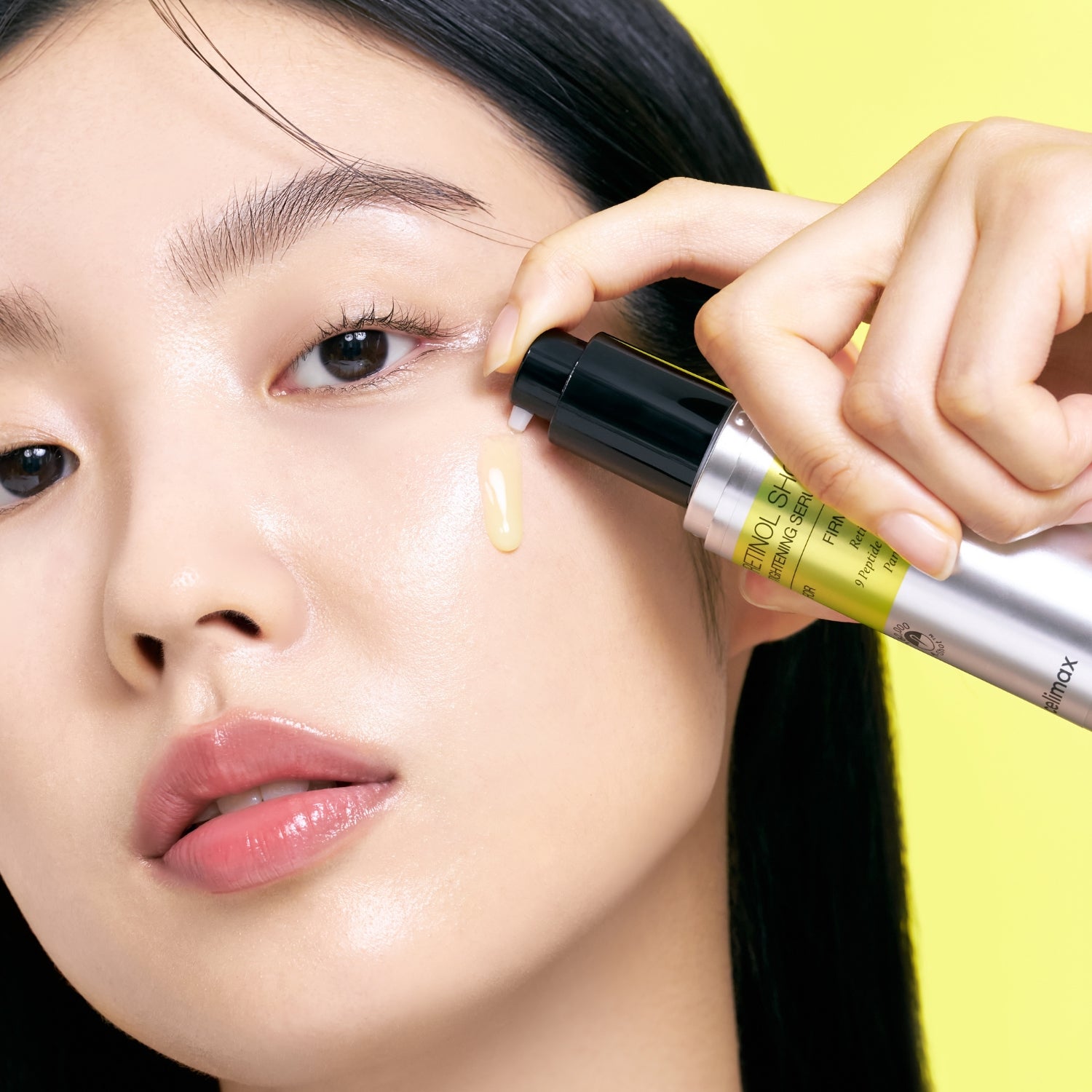 Celimax Vita-a Retinol Shot tightening serum being applied to face and throat, preparing for skincare routine.