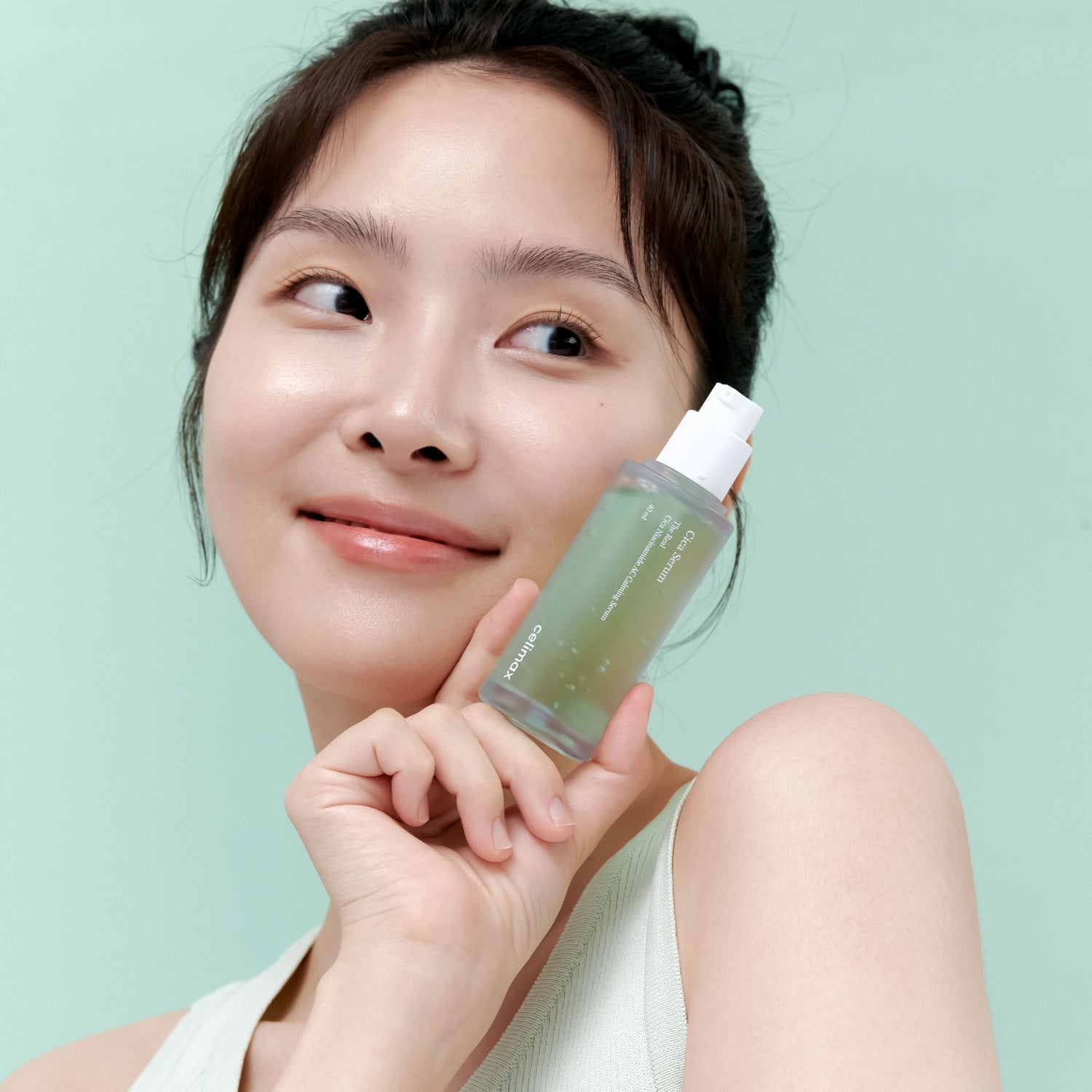 Celimax The Real Cica Niacinamide AC Calming Serum 40ml being applied to face and throat before ginseng cream.