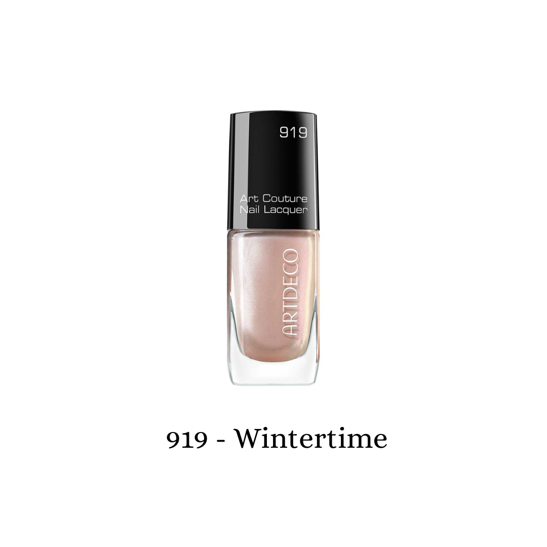 Art Couture Nail Lacquer by ARTDECO in pearl wintertime shade, showcasing a glossy, elegant nail polish on a hand.