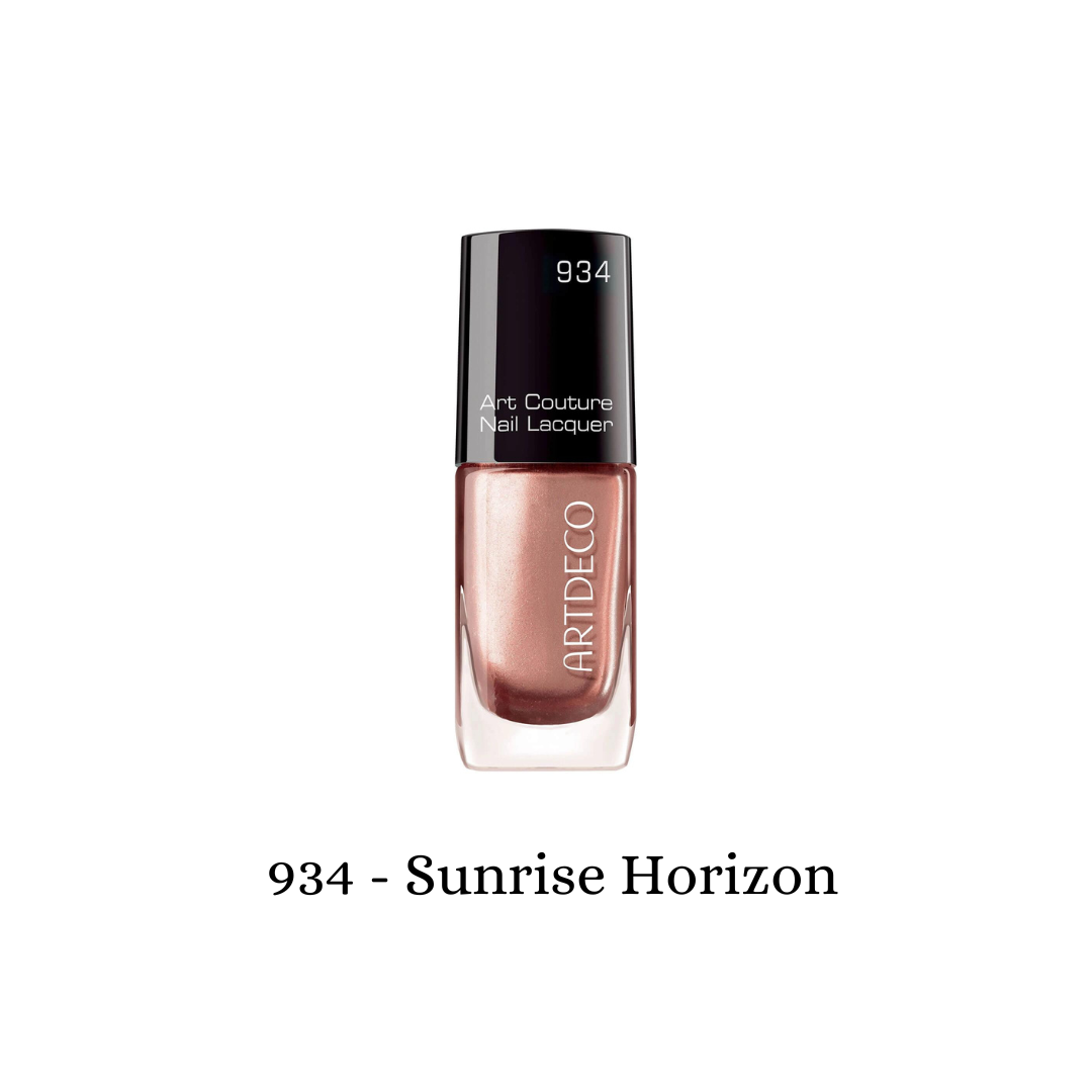 ARTDECO Art Couture Nail Lacquer in Sunrise Horizon with vibrant coral and pink nail polish on neatly manicured nails.