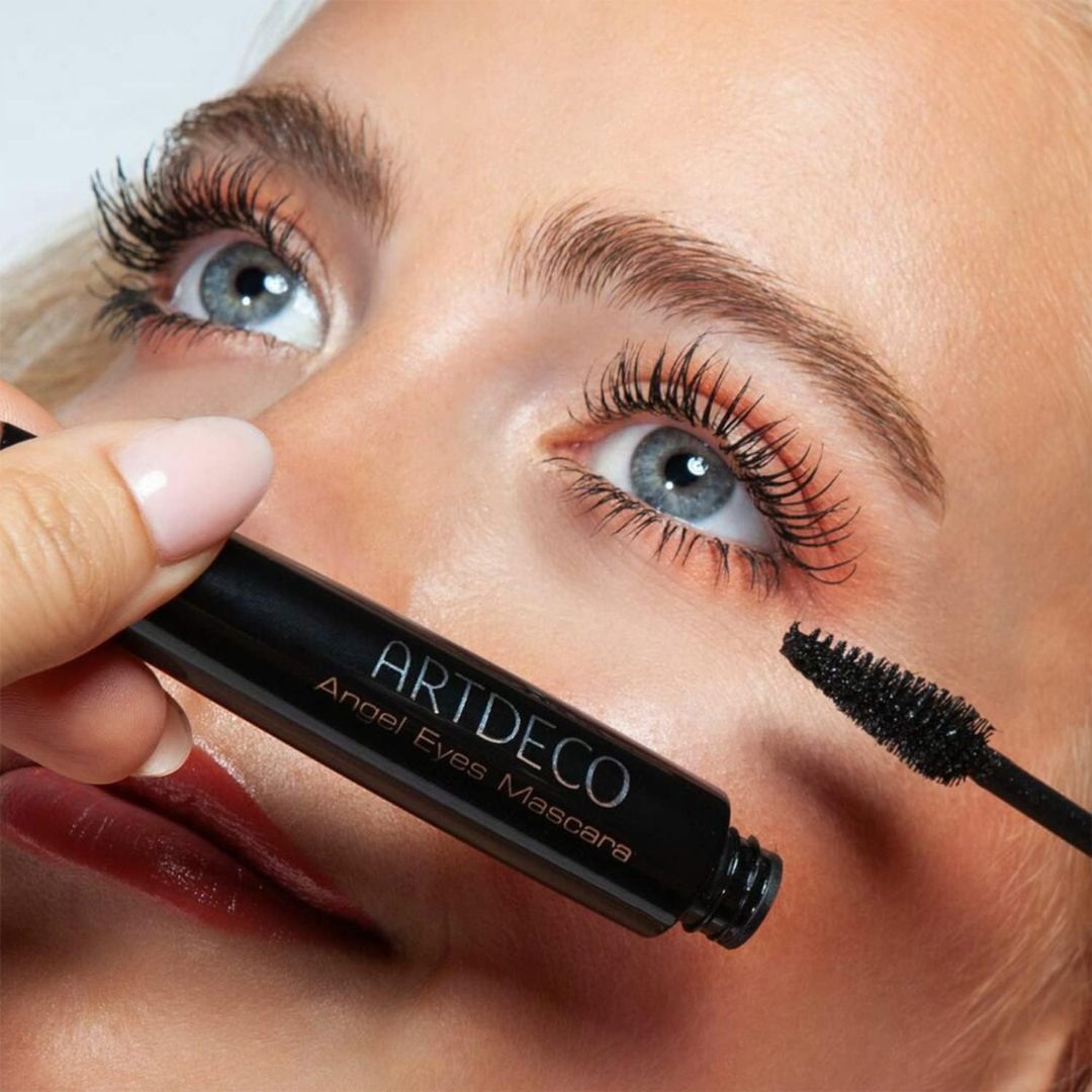 ARTDECO Angel Eyes Mascara showing a sleek black tube and wand, designed to enhance eyelashes with a natural, volumizing look.
