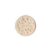 ARTDECO Glow Highlighting Powder refill showing a compact with shimmering highlighter powder inside
