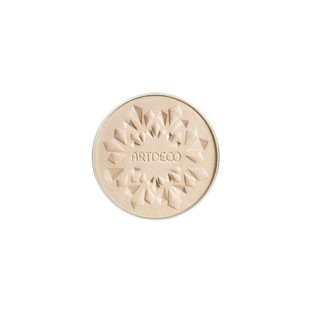 ARTDECO Glow Highlighting Powder refill showing a compact with shimmering highlighter powder inside
