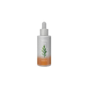 Missha Artemisia Calming Ampoule 50ml in a clear glass bottle, featuring a dropper for soothing skincare application.