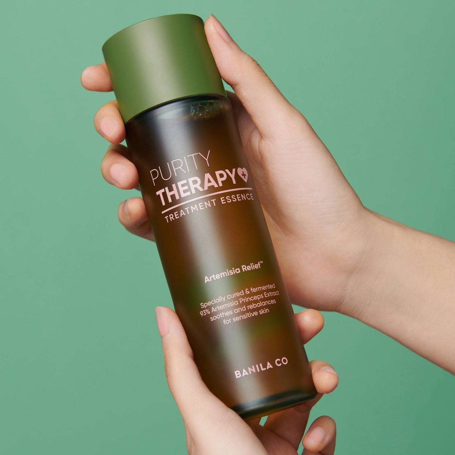 Banila Co Purity Therapy Treatment Essence in a 150ml bottle, featuring clear liquid and minimalist packaging on a white background.