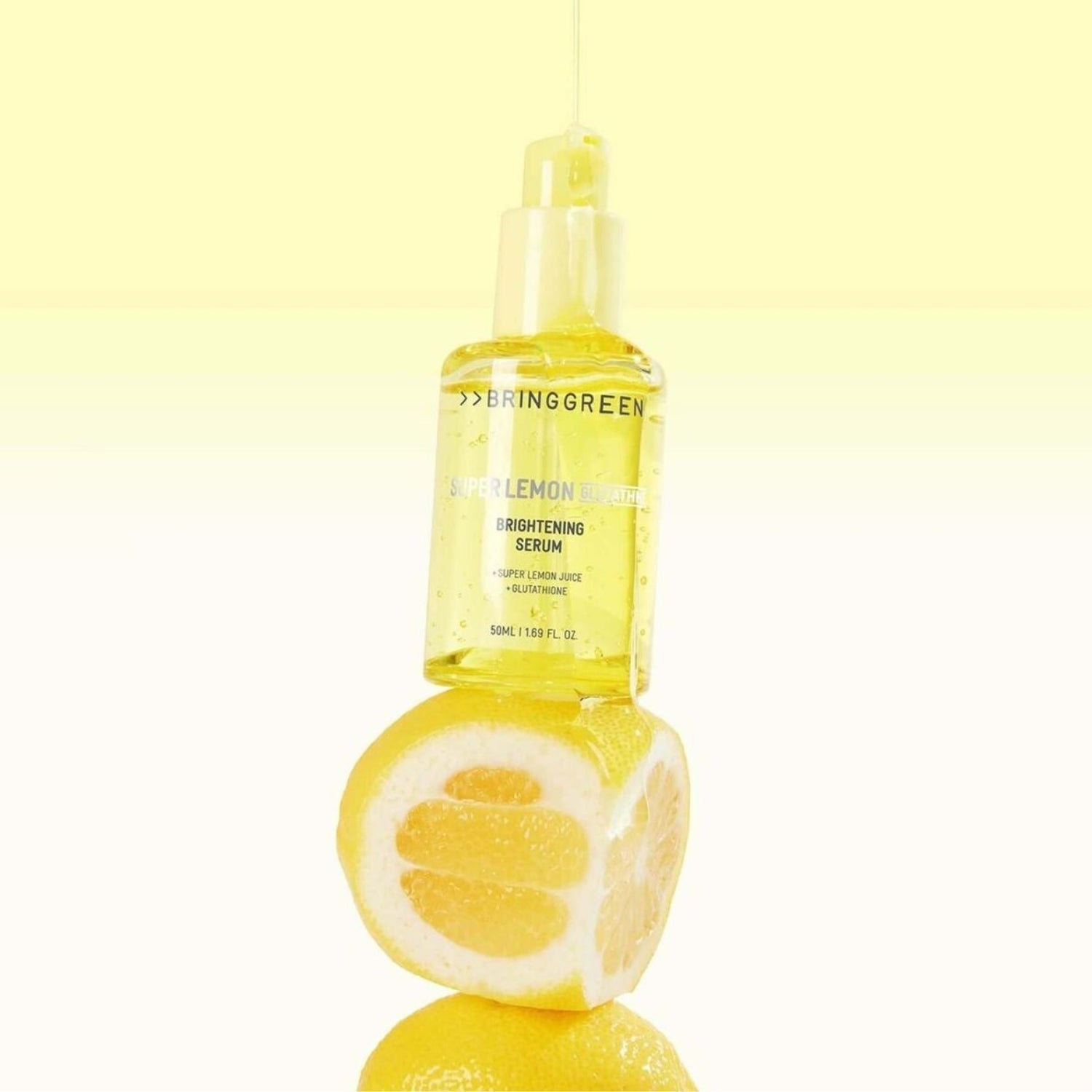 Bring Green Super Lemon Glutathione Brightening Serum Set with 50ml bottle and night activator, featuring a sleek serum bottle and packaging.